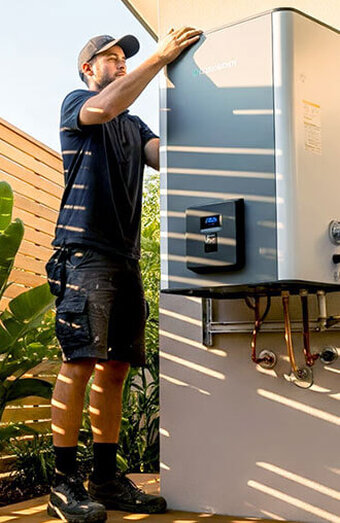 Technician Servicing Unit
